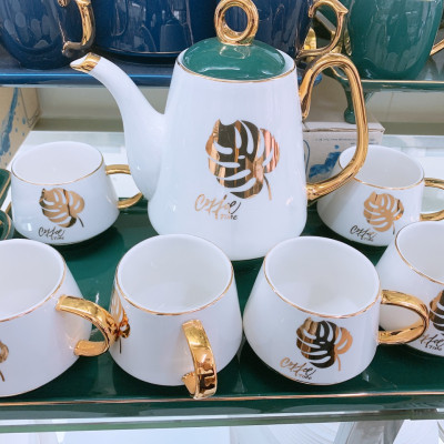 BỘ BÌNH TRÀ KÈM KHAY SỨ CÁO CẤP MÀU XANH CỔ VỊT KẾT HỢP TRẮNG HỌA TIẾT LÁ VÀNG CAO CẤP - ANTH280