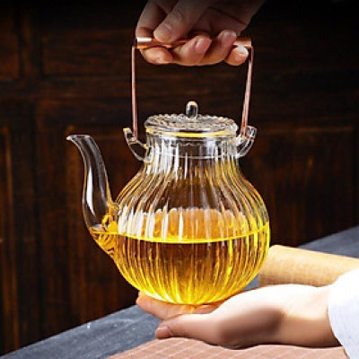 Ấm pha trà thủy tinhvaan sọc quai đồng 650ml