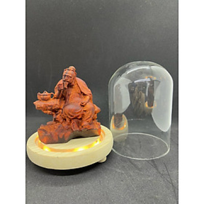 Combo Tượng ông thần trà bằng gỗ trắc đỏ đen kt 10×9×5,5cm + thêm chân đế và lồng kính đủ bộ