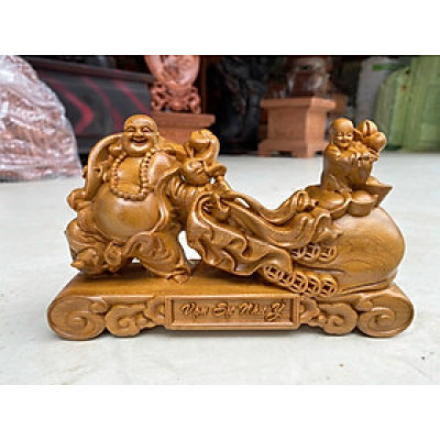 Tượng phật di lặc kéo bao tiền bằng gỗ bách xanh thơm nức kt 20×12×6cm