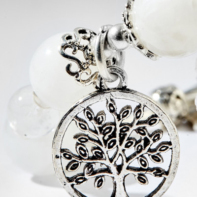 Vòng tay thạch anh ưu linh trắng charm én bạc Ngọc Quý Gemstones