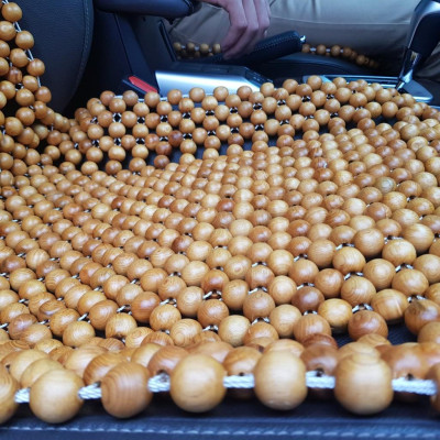 Đệm lót ghế ô tô hạt gỗ Pơ Mu 100% tự nhiên tựa lưng massage trên ô tô